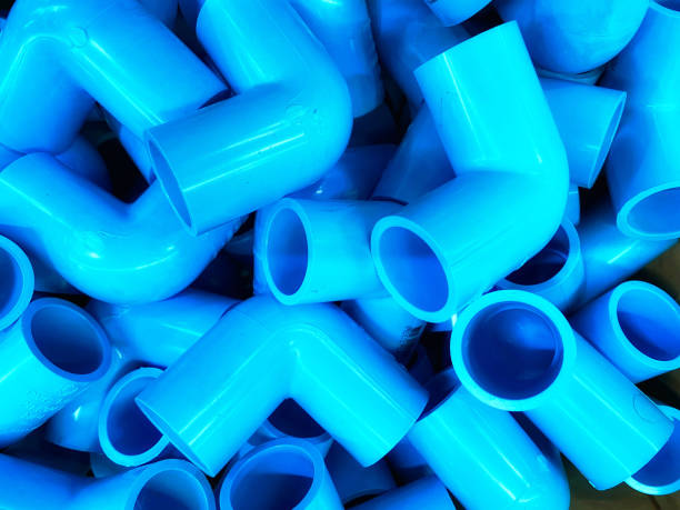 istock Blue PVC pipe set, separate on a white background, blue plastic water pipe, PVC accessories for plumbing work Plumber equipment Bend and connect the three-way plastic pipe to drain the waste water. 1752342478