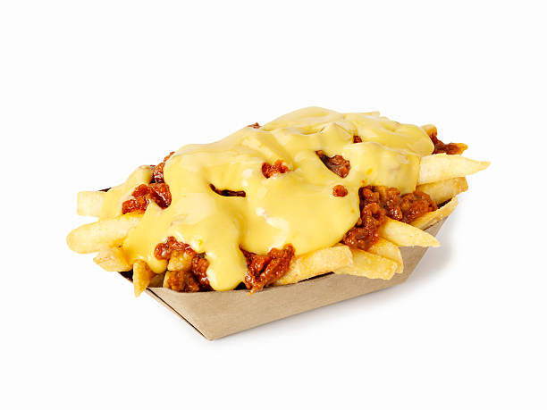 Chilli Cheese Fries Chilli Cheese Fries in a take out container -Photographed on Hasselblad H1-22mb Camera cheese sauce stock pictures, royalty-free photos & images