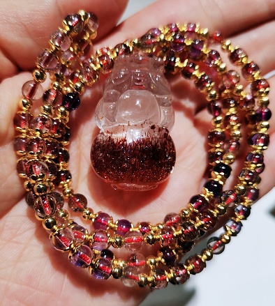 Super seven golden strawberry crystal necklace