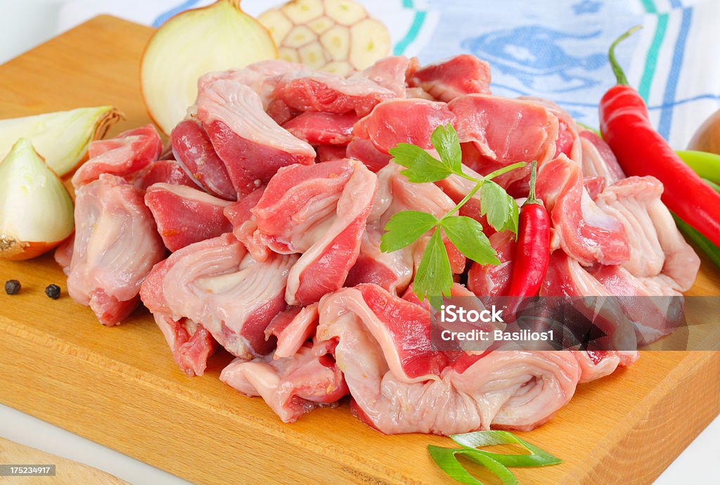 Pollo crudo gizzards - Foto stock royalty-free di Aglio - Alliacee