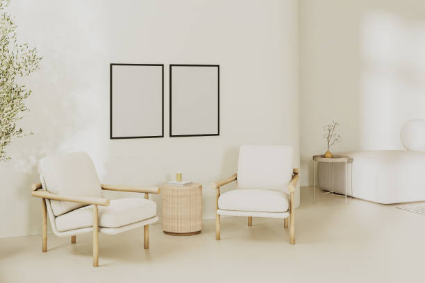 istock Empty blank poster frames mock up in modern living room interior in light beige tones with 2 armchairs and table, 3d render 1752353279