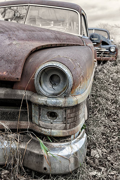 istock Old Fashioned Car Abandoned in Country Junkyard 175236108