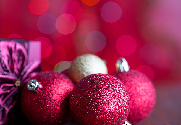 istock Christmas gift and baubles on defocused lights background 175236379