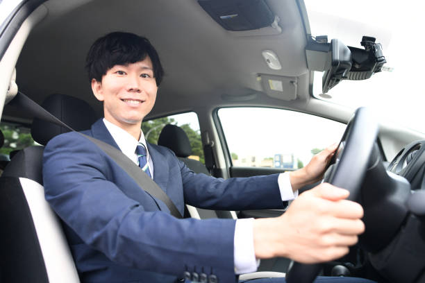 istock Asian male driver wearing a suit and driving 1752369628