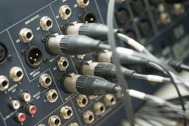 connection pins at mixing desk human hands handling with mixing desk regler stock pictures, royalty-free photos & images