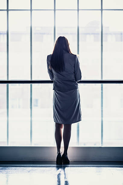 istock Drepressed businesswoman standing in the lobby 175237440