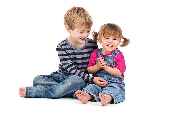 istock Small boy and toddler playing on white background 175237502