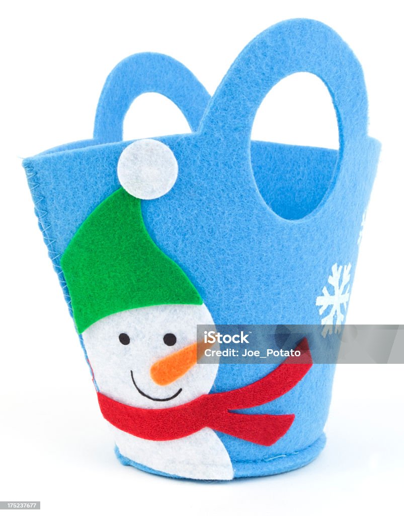 Holiday Goodie Bag Blue felt snowman holiday gift bag. Vertical.-For more jars, boxes, containers, bottles, and bags click here.  JARS, BOXES, CONTAINERS, BOTTLES, and BAGS  Bag Stock Photo