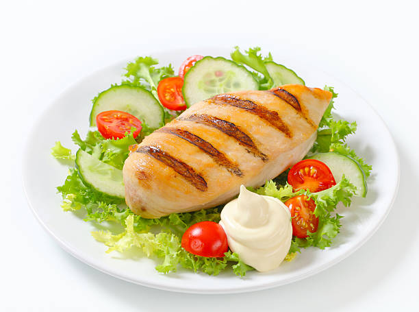 istock grilled chicken breast with vegetable garnish 175237918