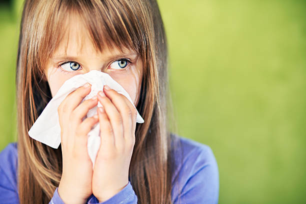 istock Little girl cleaning nose 175237937