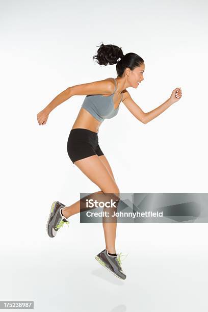 Jovem Mulher Jogging - Fotografias de stock e mais imagens de Correr - Correr, Fotografia de Estúdio, Jogging