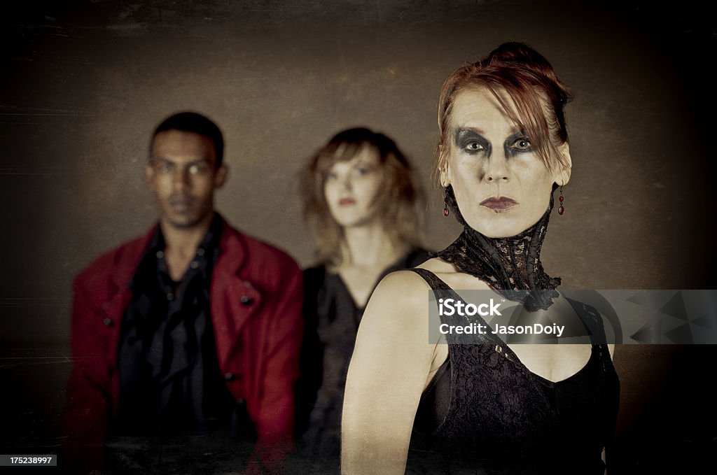 Macabre Mysterious Group A dark and mysterious group of performers Actress Stock Photo