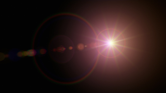 Red lens flare overlay on black background design element