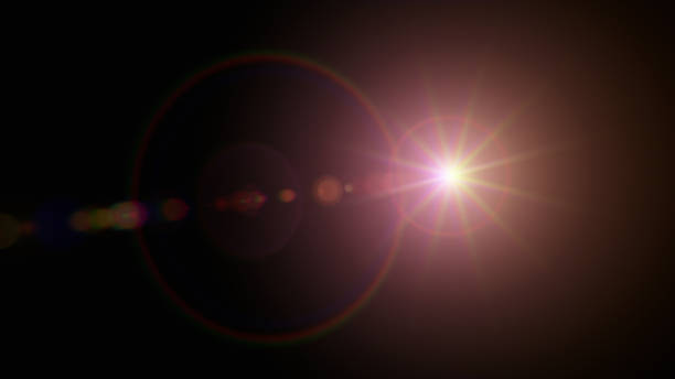 Red lens flare overlay on black background design element Red lens flare overlay on black background design element sun exposure stock pictures, royalty-free photos & images