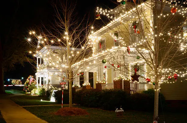 These traditional, Victorian-style, wood-siding homes are beautifully and tastefully decorated for the Holiday Season. Please view my portfolio for other Christmas Lights images.