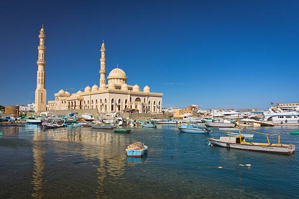 Mosque in Hurghada, Egypt "Old Arabian Marina and a new Mosque in background, Hurghada, EgyptSee more EGYPT images here:" dhow photos stock pictures, royalty-free photos & images