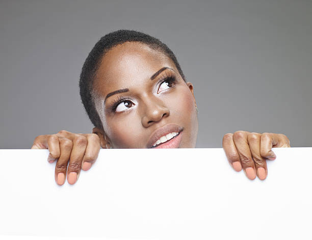 istock African-American Woman With A Sign 175239998