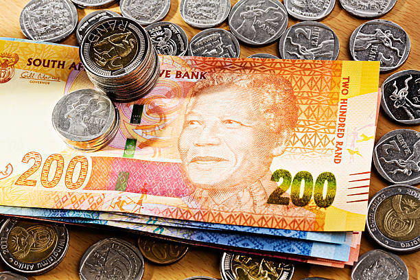 istock South African Mandela banknotes and silver coins 175241099
