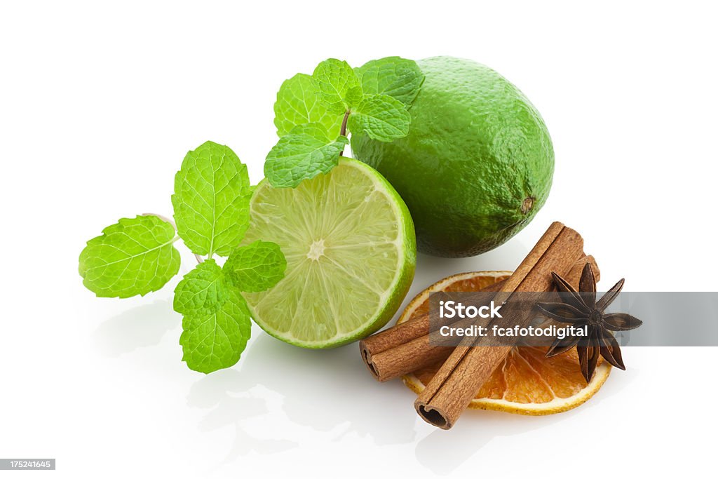 Aromatherapy, Alternative Medicine "Lemon, Dried Orange Slice, Cinnamon Sticks and Star Anise Isolated on White Background." Alternative Medicine Stock Photo