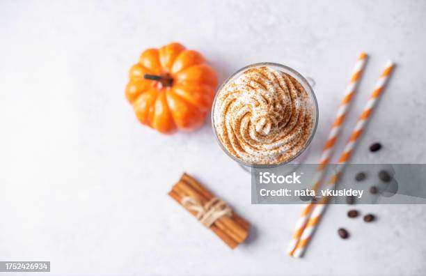 Pumpkin Spice Latte With Whipped Cream And Cinnamon In A Glass Stock Photo - Download Image Now
