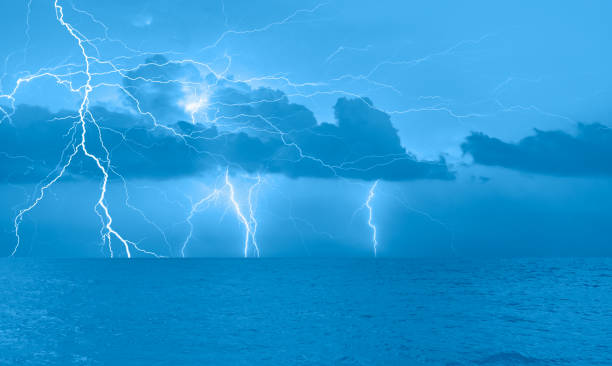 istock Beautiful landscape with lightning over the calm sea 1752436497