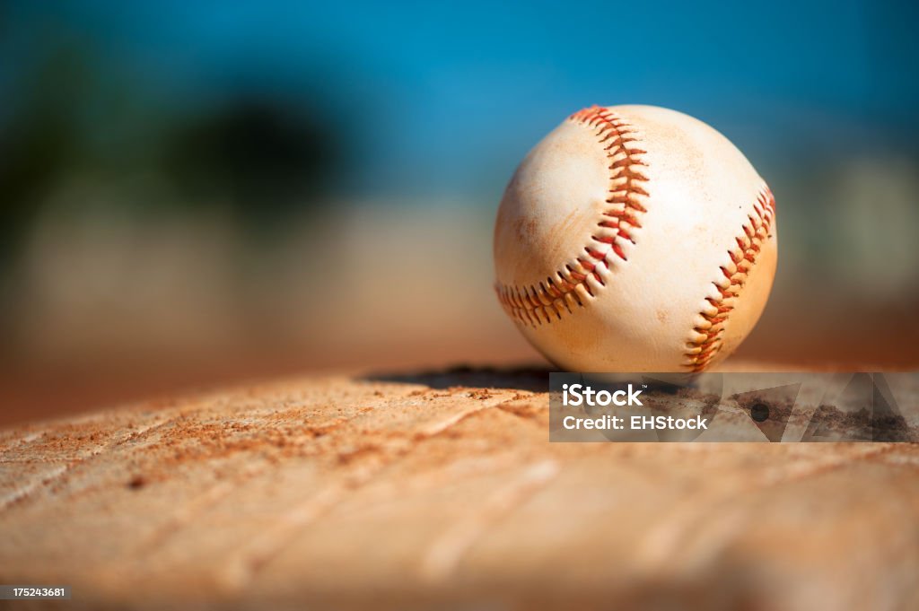 Youth League Baseball on First Base Close Up Baseball - Ball Stock Photo