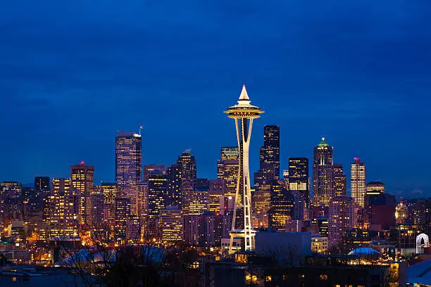 Seattle skyline night at Christmas. Christmas decorations and Christmas tree on top of Space Needle.more cityscapes: