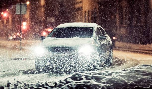 istock Late night traffic on a severe snow storm 175244054