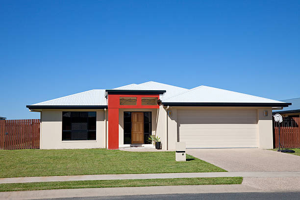 istock Suburban Family Home with clear blue sky copyspace 175244438