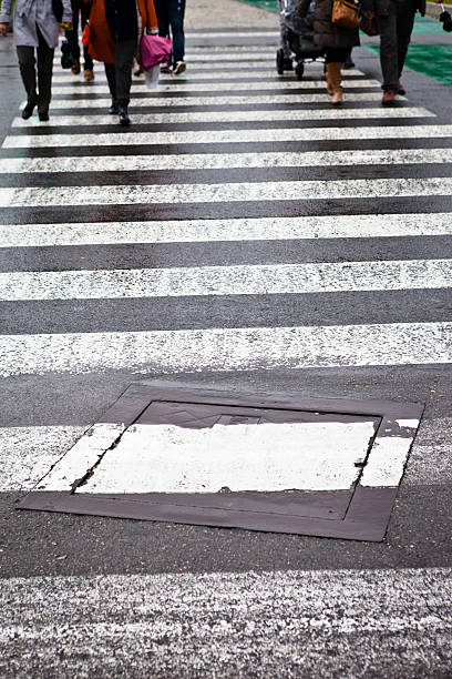 istock Pedestrians crossing street 175246022