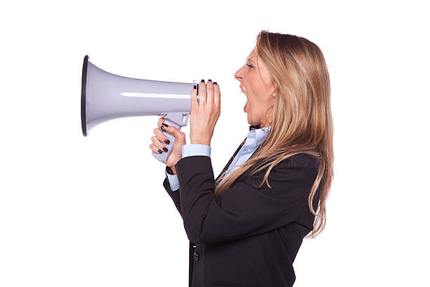 donna d'affari urlando nel megafono - complaining megaphone speech businesswoman foto e immagini stock