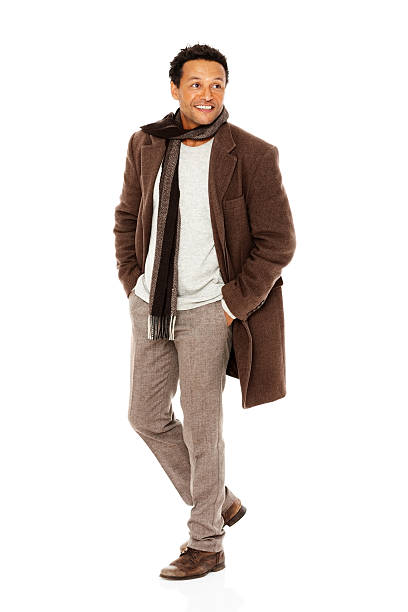 istock Attractive mature guy in casual winter clothing posing over white 175247011