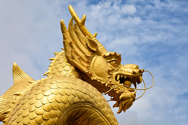istock Golden dragon statue in temple 175247023
