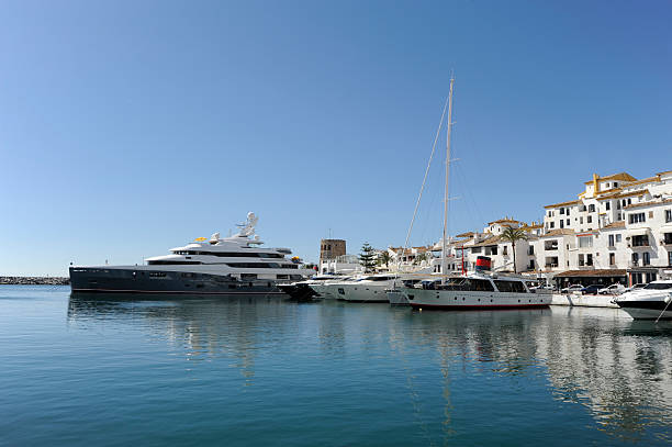 Some of the luxury boats and tachts moored in the Puerto Banus marina in Marbella Costa Del Sol. Spain. No filters were used on this file.
