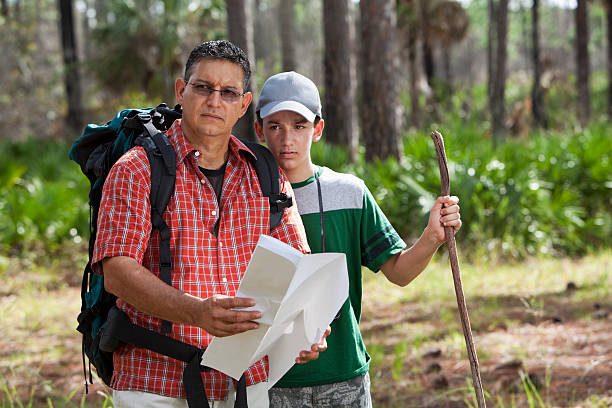 istock Hispanic father and son hiking. 175247414