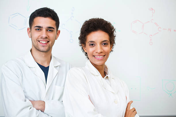 retrato de chemists - medical research couple university fine art portrait fotografías e imágenes de stock