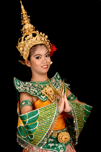 Asian Woman Dancers in Suit of Bird and Sawasdee Action (Sawasdee mean say hi in Thailand)