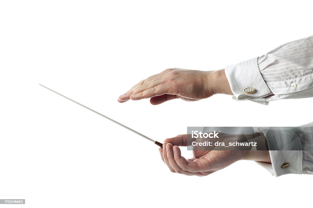 Conductor de manos con un baton - Foto de stock de Director de orquesta libre de derechos