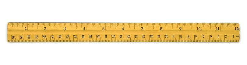 Plastic stationery ruler in the unit of measurement centimeters, isolated from background