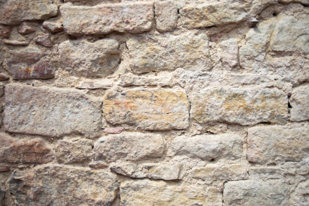 istock Stone wall with old bricks of the acient castle. 1752490509