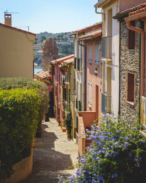 Collioure, french mediterranean touristic city, South of France, where the mountain embrace the sea. Collioure's Mediterranean Charm, a Scenic Tourist Gem Nestled Between Sun-Kissed Shores and Majestic Mountains. collioure stock pictures, royalty-free photos & images