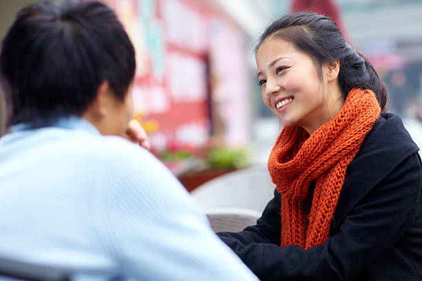 istock happy young friend talking together 175249630