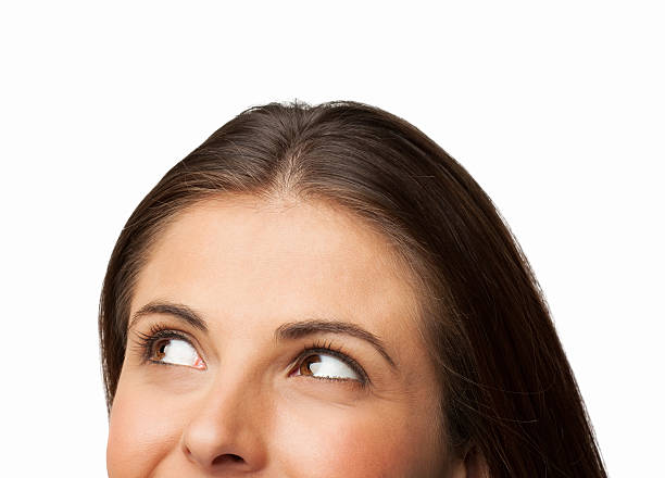 istock Young Woman Looking Upwards - Isolated 175250091