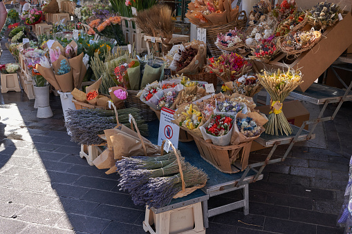 Nice, France - August 12, 2023 - flowers are on sale in the street Cours Saleya market