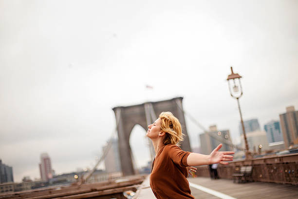 radość życia - inhaling breathing exercise new york city joy zdjęcia i obrazy z banku zdjęć