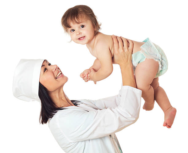 istock Doctor holding baby over his head. 175250524