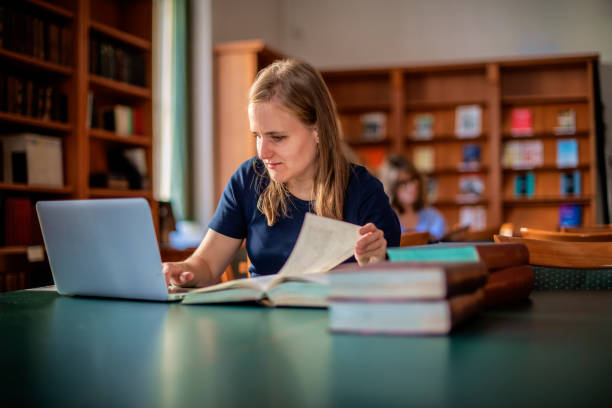 istock A visually impaired woman sitting and studying in the university library 1752510909