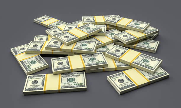 istock Money stacks from dollars isolated on grey. Dollar finance conceptual 1752511475
