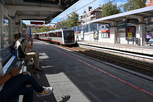 Getxo, Spain, October 17, 2023 - Neguri station of line 1 with train of series UT500 of Bilbao Metro.