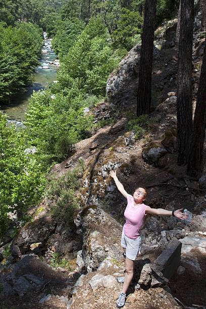 istock Woman opened her arms in forest 175251407